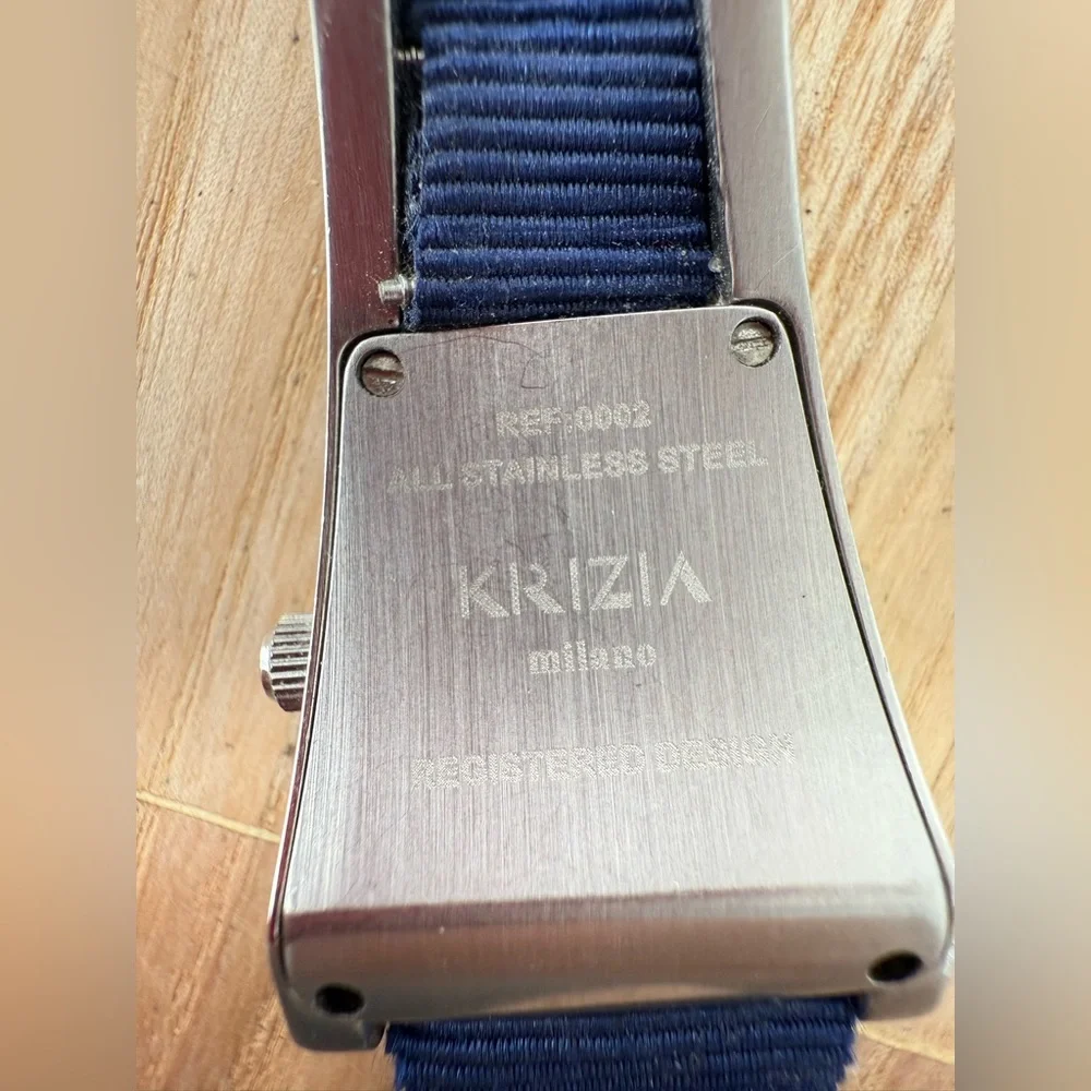 Krizia ladies silver tone trapezoidal watch NEW BATTERY